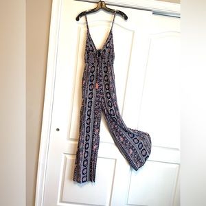 Women’s summer jumpsuit. Size small .Material Rayon